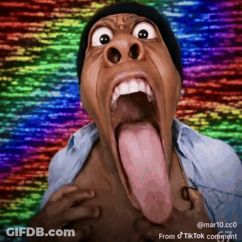 A Man With A Long Tongue Sticking Out And A Rainbow Background GIF