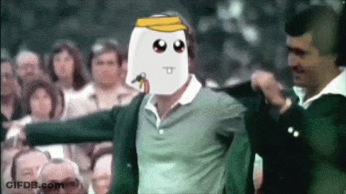 A Man With A Marshmallow On His Face Stands In A Crowd GIF