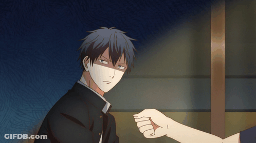 A Man With A Mask On His Face Is Being Punched By Another Man GIF