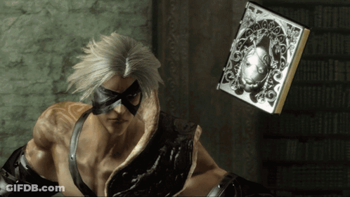 A Man With A Mask On His Face Is Holding A Book GIF
