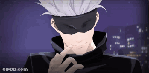 A Man With A Mask On His Face Is Pointing To His Face GIF