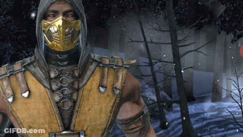 A Man With A Mask On His Face Is Standing In A Forest GIF