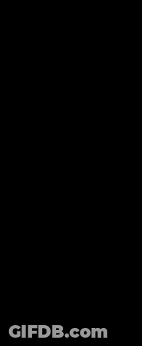 A Man With A Mask On His Face Is Wearing A Long White Coat GIF