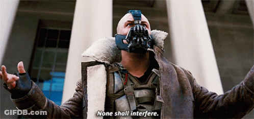 A Man With A Mask On His Face Says " None Shall Interfere " GIF