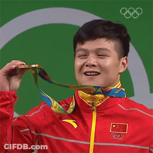 A Man With A Medal Around His Neck That Says China On It GIF