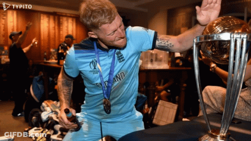 A Man With A Medal Around His Neck That Says " England " On It GIF