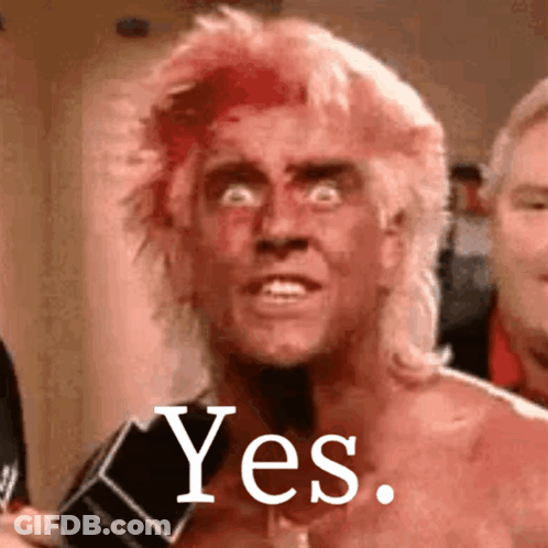 A Man With A Microphone In His Hand Says Yes GIF