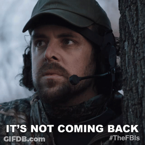 A Man With A Microphone On His Head And The Words It 'S Not Coming Back Below Him GIF