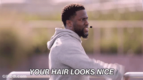 A Man With A Microphone On His Head Says " Your Hair Looks Nice " GIF