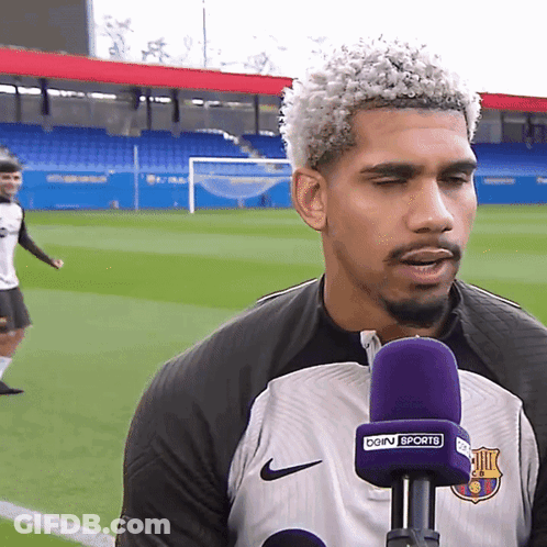 A Man With A Microphone That Says Bein Sports GIF