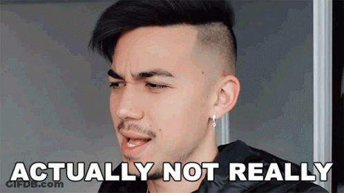 A Man With A Mohawk And Earrings Says " Actually Not Really " In Front Of His Face GIF