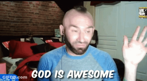 A Man With A Mohawk Says God Is Awesome In A Bedroom GIF