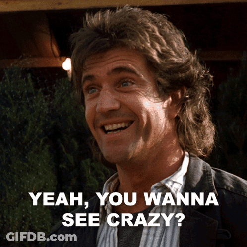 A Man With A Mullet Smiles And Says " Yeah You Wanna See Crazy " GIF