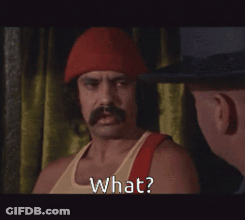 A Man With A Mustache And A Red Hat Says What GIF