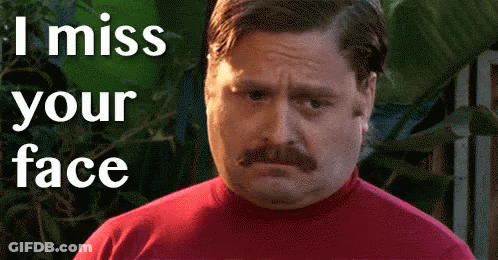 A Man With A Mustache And A Red Shirt Says I Miss Your Face . GIF