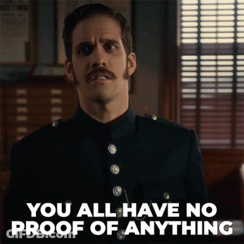 A Man With A Mustache Has The Words You All Have No Proof Of Anything Above Him GIF