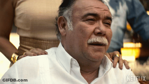 A Man With A Mustache Is Being Comforted By A Woman With A Netflix Logo On The Bottom GIF