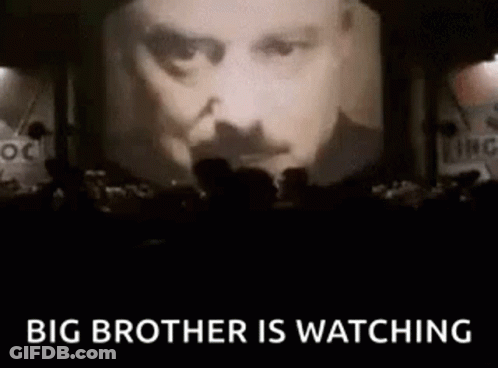 Man With Mustache Projected On Screen GIF