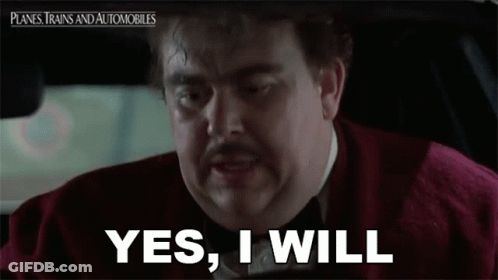 A Man With A Mustache Is Driving A Car And Says `` Yes , I Will '' . GIF