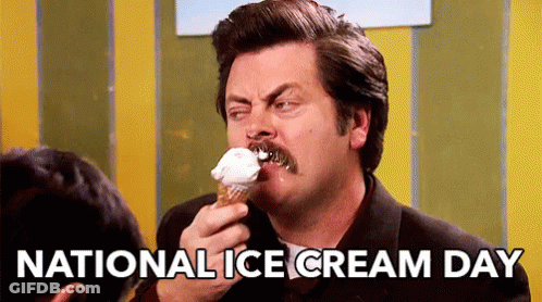 A Man With A Mustache Is Eating A Cone Of Ice Cream On National Ice Cream Day . GIF