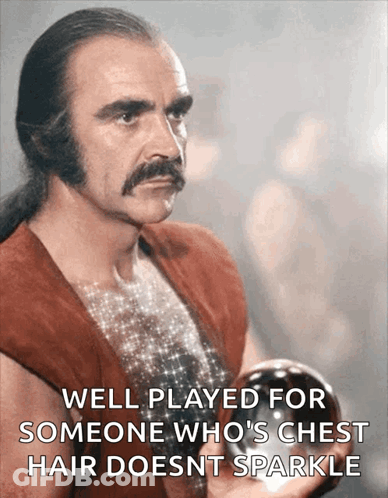 A Man With A Mustache Is Holding A Ball And Says Well Played For Someone Who 'S Chest GIF