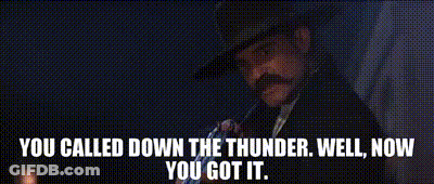 A Man With A Mustache Is Holding A Gun And Says You Called Down The Thunder Well Now You Got It . GIF