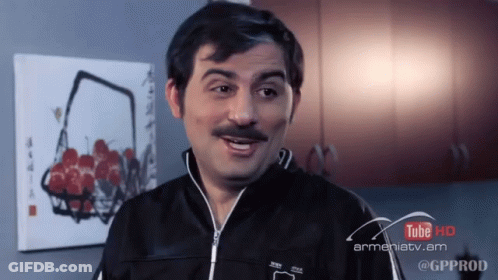 A Man With A Mustache Is In Front Of A Sign That Says Youtube Hd GIF