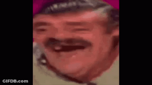 A Man With A Mustache Is Laughing With His Eyes Closed . GIF