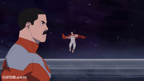 A Man With A Mustache Is Looking At A Superhero Flying Through The Air GIF