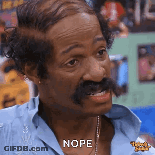 A Man With A Mustache Is Making A Funny Face And Saying Nope GIF