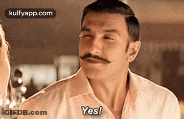 A Man With A Mustache Is Making A Funny Face And Saying `` Yes '' . GIF