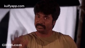 Man With Mustache Making Funny Face GIF