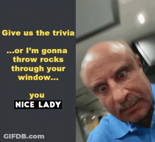A Man With A Mustache Is Next To A Sign That Says " Give Us The Trivia " GIF