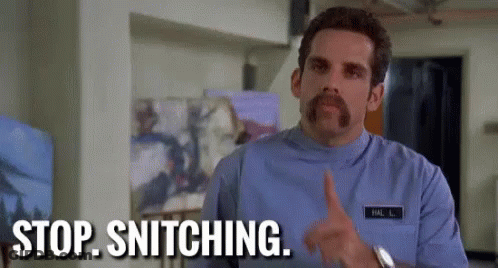 A Man With A Mustache Is Pointing At The Camera And Says `` Stop Snitching '' . GIF
