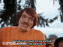 A Man With A Mustache Is Saying " And You Can Count On Me Waiting For You In The Parking Lot " . GIF