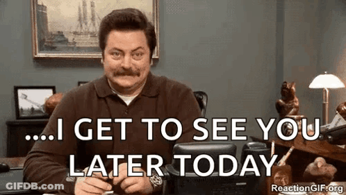 A Man With A Mustache Is Sitting At A Desk And Says `` I Get To See You Later Today . '' GIF