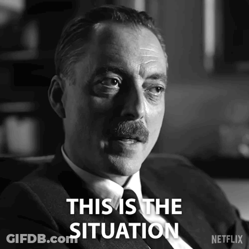 A Man With A Mustache Is Sitting In A Chair And Says " This Is The Situation " GIF