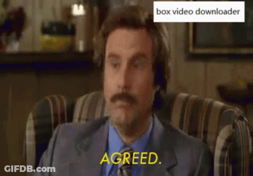 A Man With A Mustache Is Sitting In A Chair With His Eyes Closed And Says Agreed GIF
