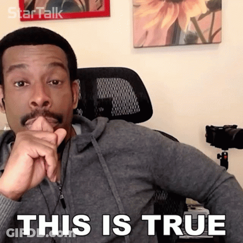 A Man With A Mustache Is Sitting In A Chair With His Hand On His Chin And The Words This Is True Above Him GIF