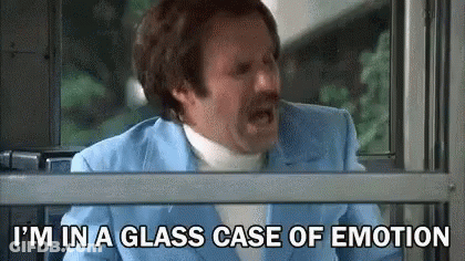 A Man With A Mustache Is Sitting On A Bus And Yelling . GIF