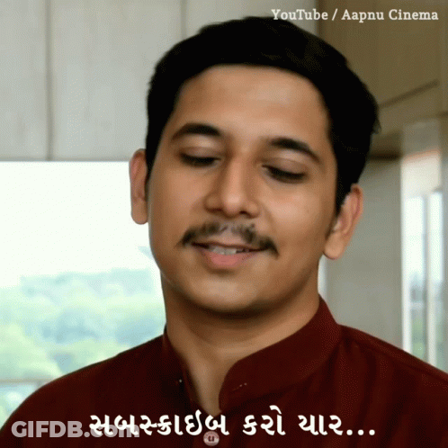 A Man With A Mustache Is Smiling With A Caption That Says Youtube / Aapnu Cinema GIF