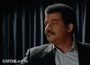 A Man With A Mustache Is Smiling With The Word Science Written On His Face . GIF