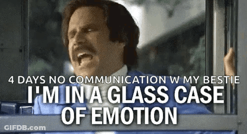 A Man With A Mustache Is Standing In Front Of A Window And Screaming . GIF