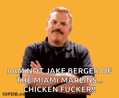 A Man With A Mustache Is Standing With His Arms Crossed And Says I Am Not Jake Berger GIF