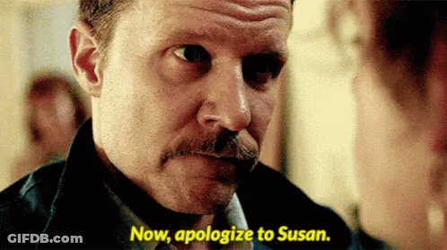 A Man With A Mustache Is Talking To A Woman And Says Now Apologize To Susan GIF