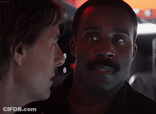 A Man With A Mustache Is Talking To Another Man With The Word Kepler On The Bottom Left GIF