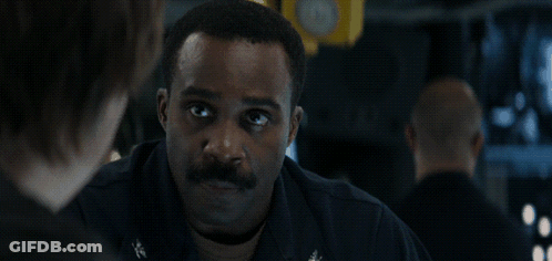 A Man With A Mustache Is Talking To Another Man With The Words " You 'Ve Come To The Right Man " Above Him GIF