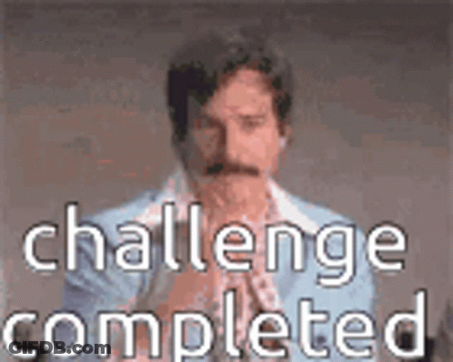 A Man With A Mustache Is Wearing A Blue Suit And A White Shirt . GIF