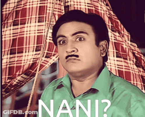 A Man With A Mustache Is Wearing A Green Shirt And A Plaid Shirt With The Words Nani Written On It GIF
