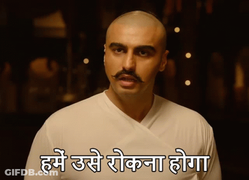 A Man With A Mustache Is Wearing A White Shirt And Has A Caption In Another Language GIF